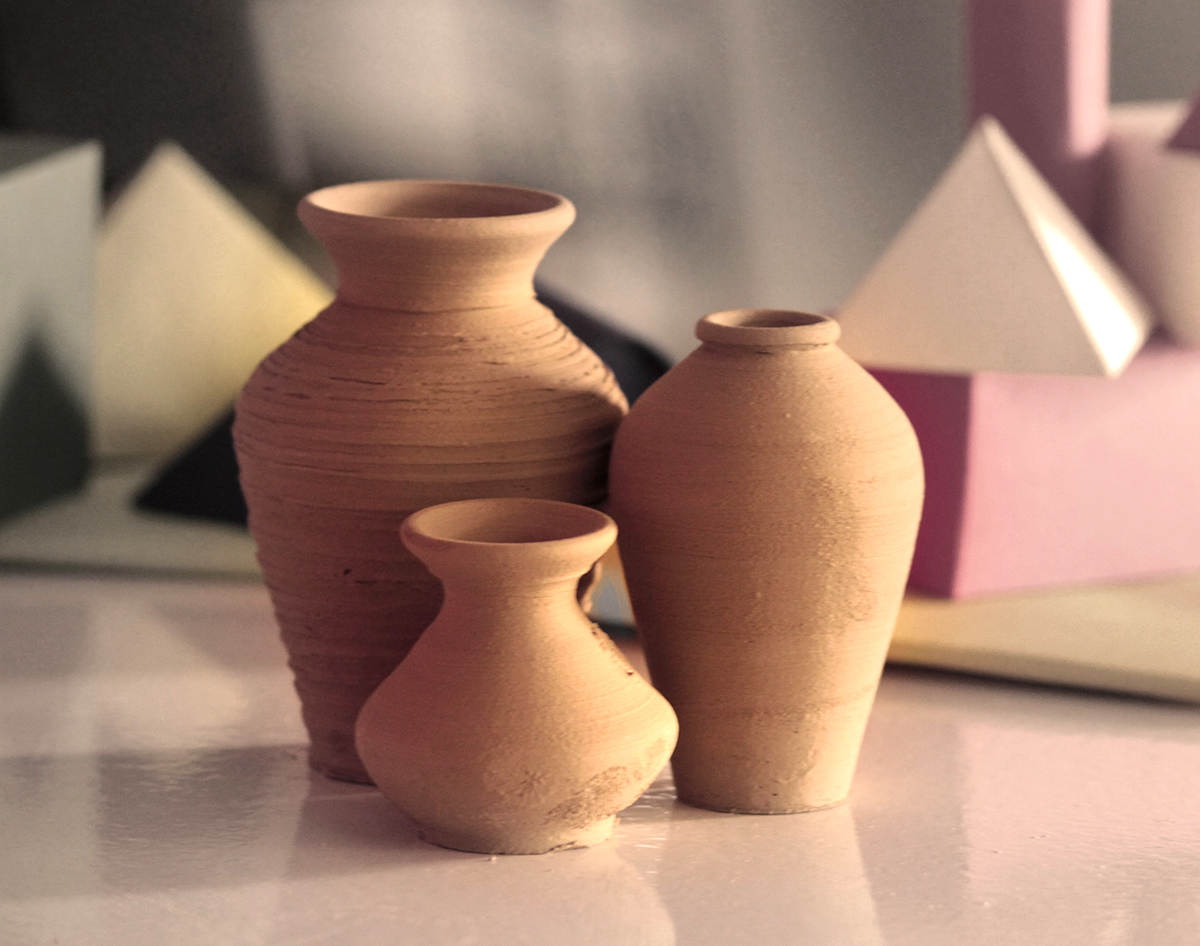 set of three clay vases